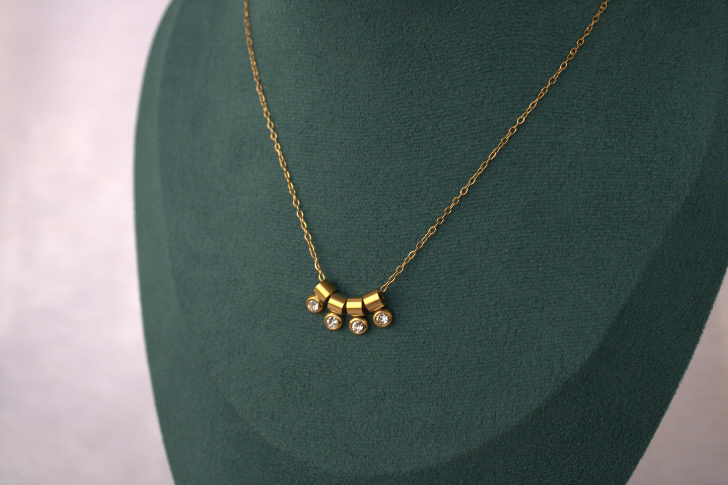 Four Small Charms Rani Necklace