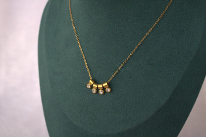 Four Small Charms Rani Necklace