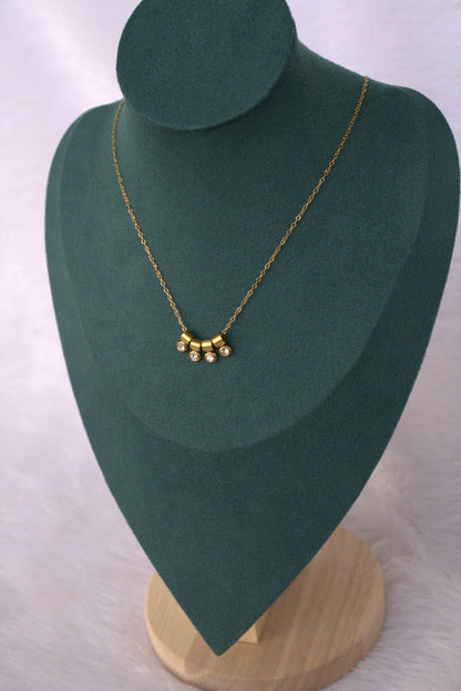 Four Small Charms Rani Necklace